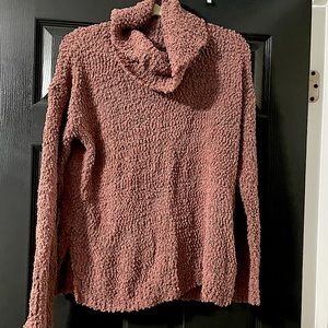 Dusty rose loose turtleneck styled sweater
